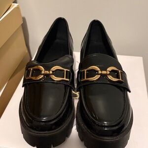 Elegant Black Loafers with Gold Accent